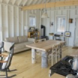 An owner-built cottage on Cape Breton Island with traditional and contemporary details. It has two bedrooms in 768 sq ft. | www.facebook.com/SmallHouseBliss