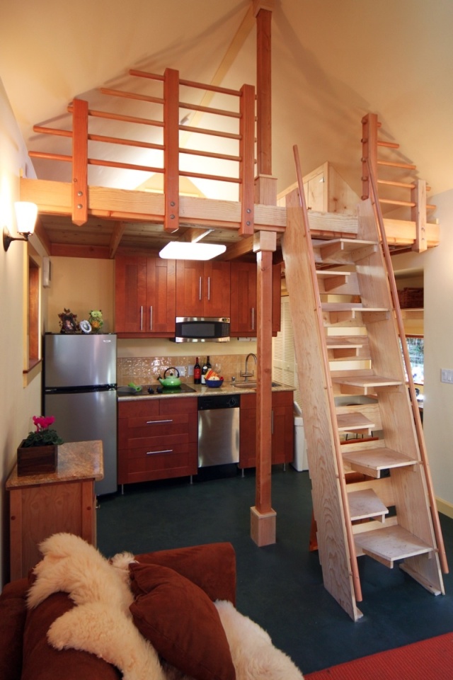 Karen's backyard cottage has 265 sq ft of living space plus a sleeping loft. | www.facebook.com/SmallHouseBliss