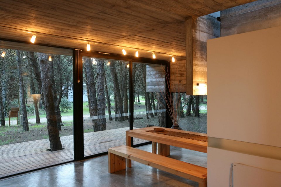 A low-maintenance concrete and glass house in Argentina with 2 bedrooms in 721 sq ft. | www.facebook.com/SmallHouseBliss
