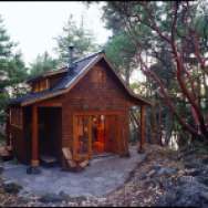 This small cabin in the woods on Orcas Island has a 350 sq ft ground floor plus a sleeping loft. | www.facebook.com/SmallHouseBliss
