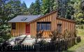 A woodsy cottage by architect Cathy Schwabe with 2 bedrooms in 840 sq ft | www.facebook.com/SmallHouseBliss