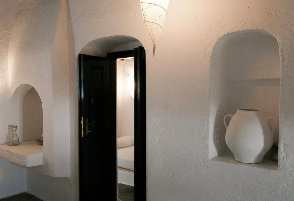 A traditional house on Mykonos was restored, staying true to the island's architectural history. It has two bedrooms and a loft in 840 sq ft. | www.facebook.com/SmallHouseBliss