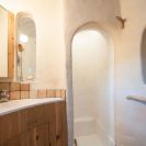 A one-bedroom storybook cottage with curved walls sculpted from cob, a mixture of clay, sand and straw. | www.facebook.com/SmallHouseBliss