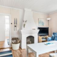 This cozy 1930 cottage is located in a small town on Sweden's coast. It has two bedrooms in 506 sq ft. | www.facebook.com/SmallHouseBliss