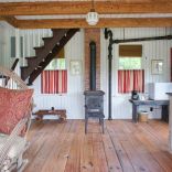 A 100-year-old barn converted into a small house with one bedroom in 650 sq ft. | www.facebook.com/SmallHouseBliss
