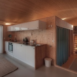 This modern wood cabin sits on the rugged coast of Norway. It has a bedroom, a sleeping nook and a loft, all in a footprint of just 645 sq ft. | www.facebook.com/SmallHouseBliss